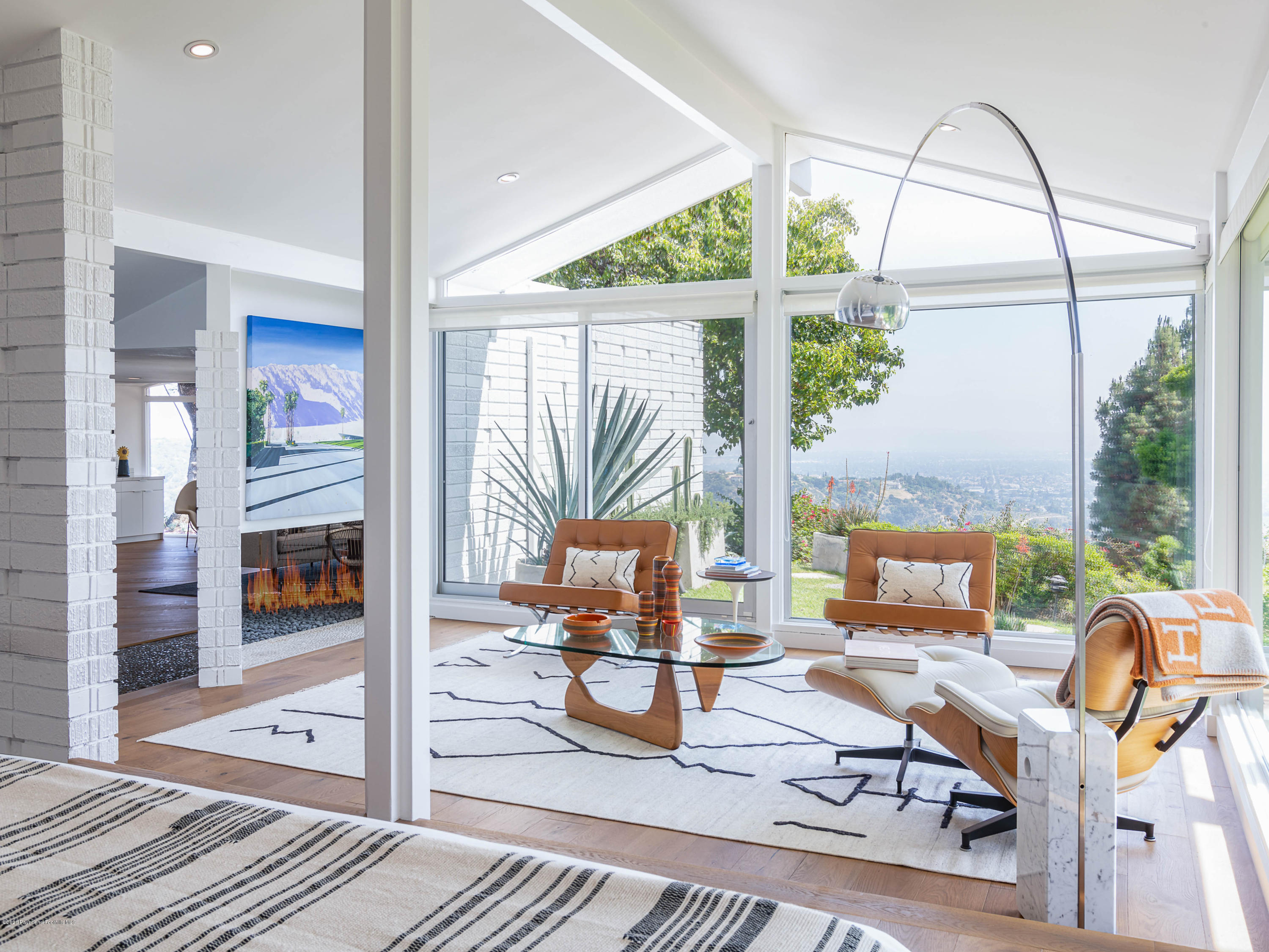 2210 Cielo Place Arcadia, CA 91006 - Photo 17 of 39 a living room with patio furniture and a floor to ceiling window