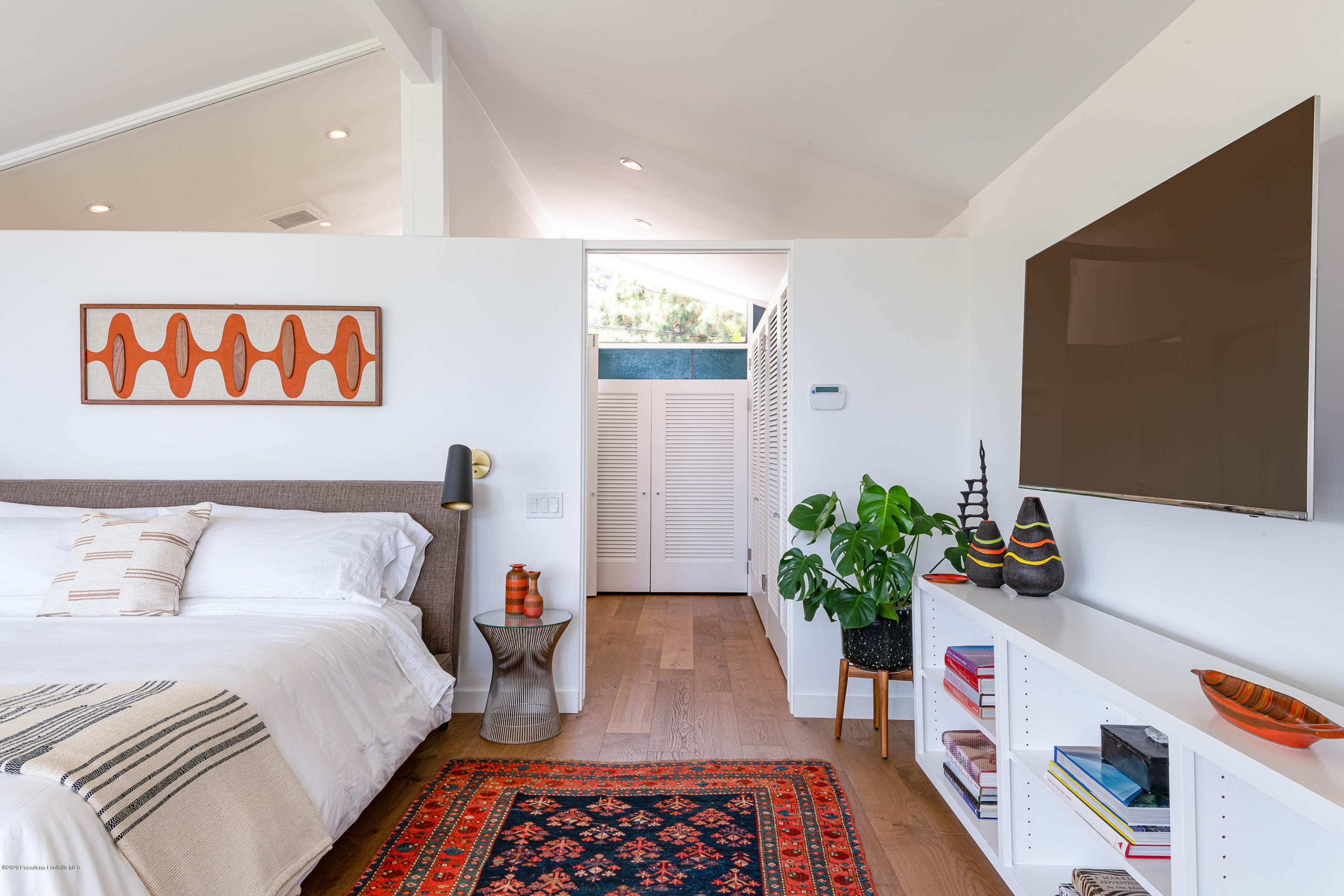 2210 Cielo Place Arcadia, CA 91006 - Photo 20 of 39 a bed room with a bed and a book shelf
