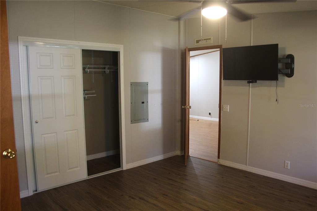 24427 Wild Turkey Road Paisley, FL 32767 - Photo 16 of 55 a view of a livingroom with wooden floor