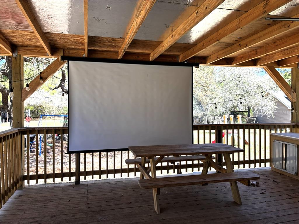 24427 Wild Turkey Road Paisley, FL 32767 - Photo 23 of 55 a view of a chairs and table in the balcony