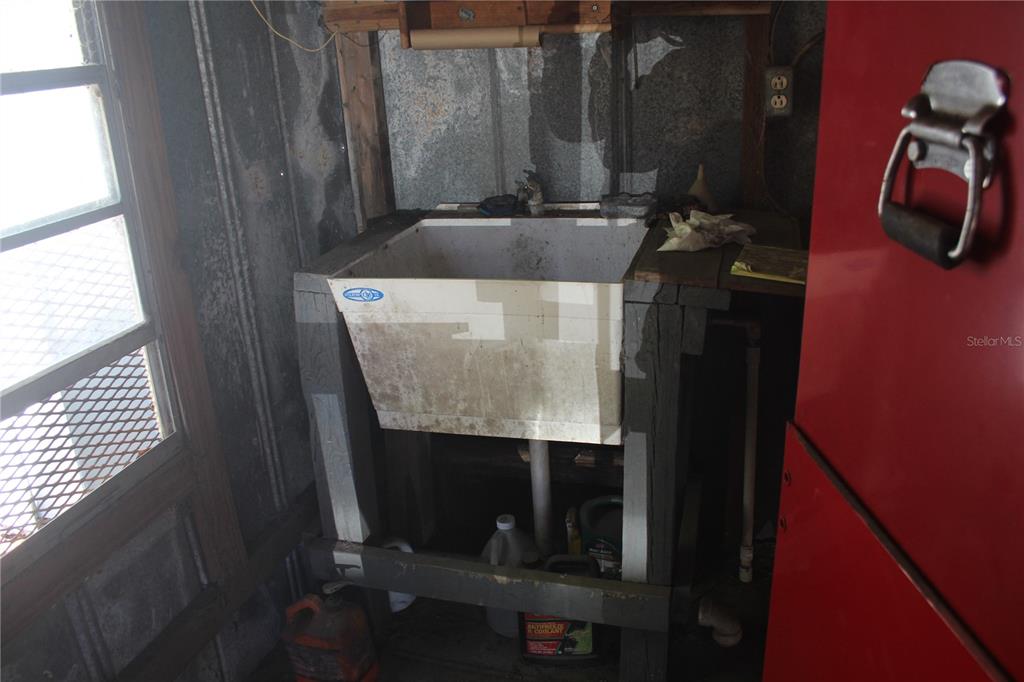 24427 Wild Turkey Road Paisley, FL 32767 - Photo 31 of 55 a bathroom with a sink and mirror