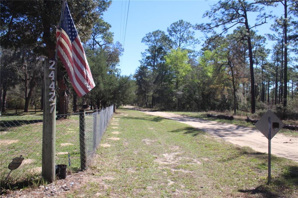 24427 Wild Turkey Road Paisley, FL 32767 - Photo 48 of 55 a view of swimming pool with a yard