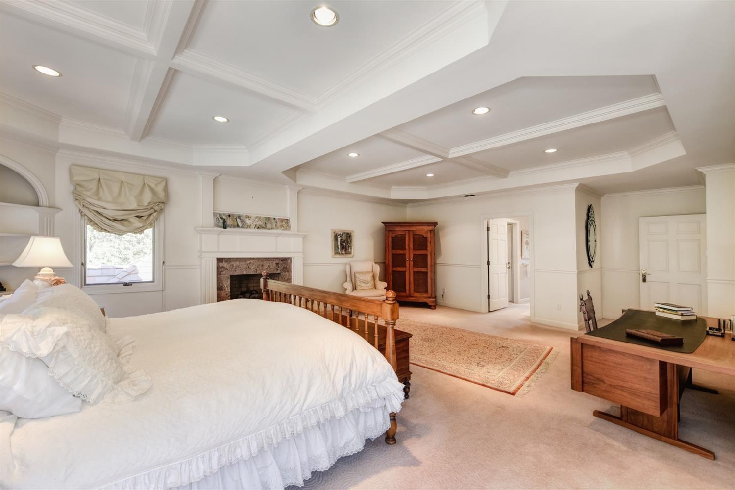 557 Crocker Road Sacramento, CA 95864 - Photo 16 of 21 a spacious bedroom with a large bed and a dresser