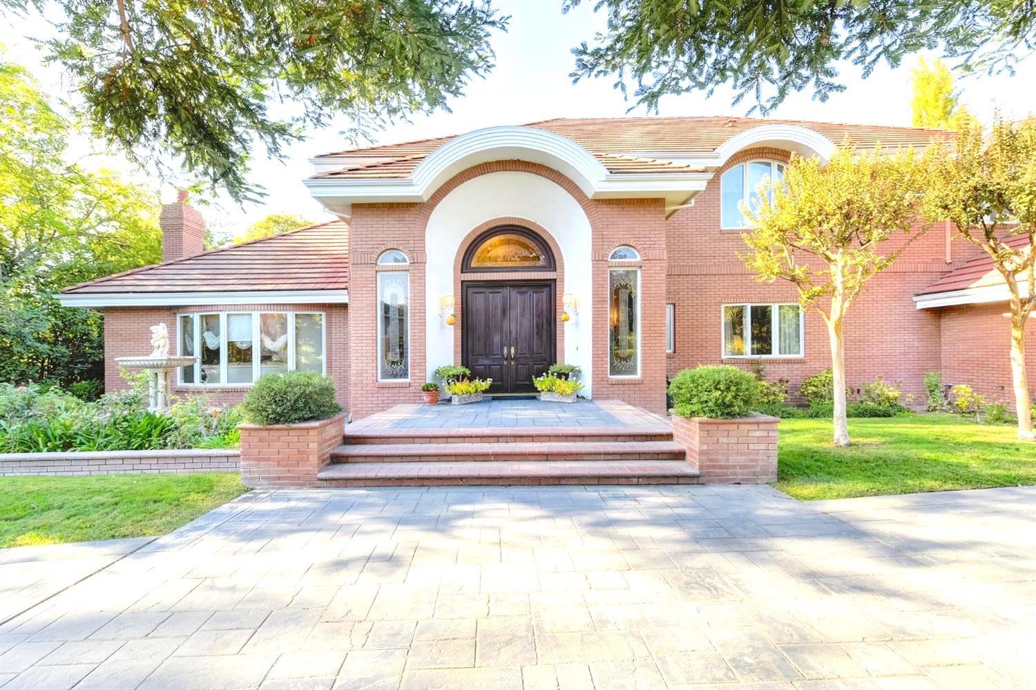 557 Crocker Road Sacramento, CA 95864 - Photo 2 of 21 a front view of a house with a garden