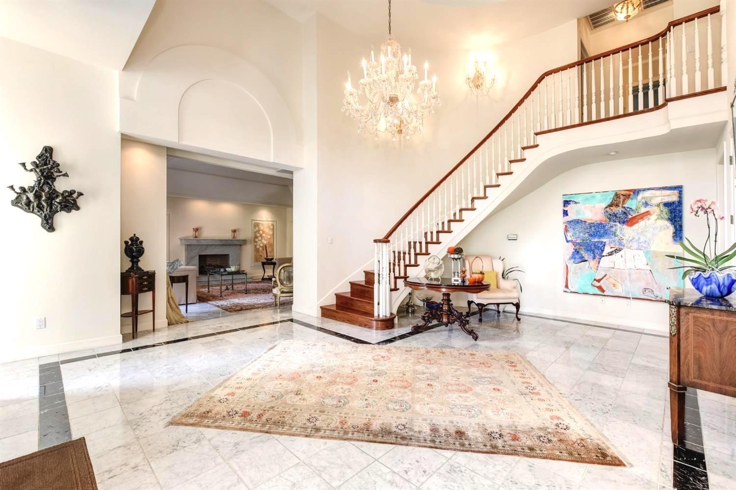 557 Crocker Road Sacramento, CA 95864 - Photo 4 of 21 a living room with furniture and a chandelier