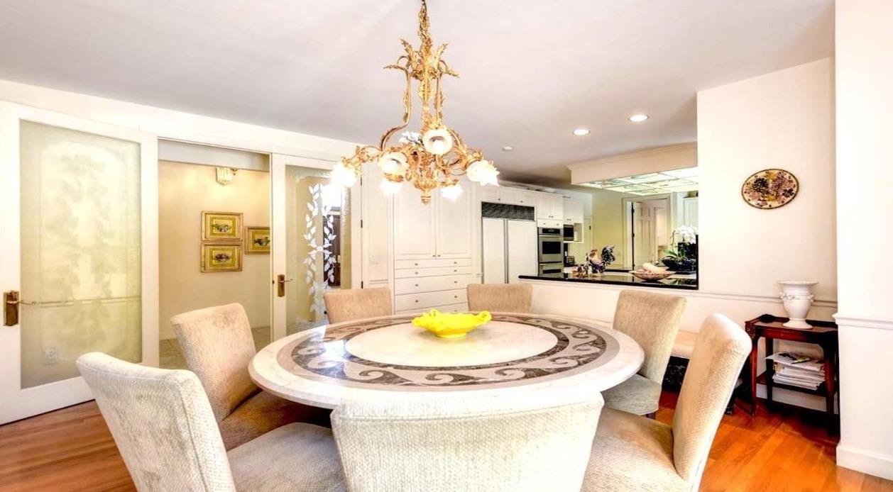557 Crocker Road Sacramento, CA 95864 - Photo 7 of 21 a view of a dining room with furniture and a chandelier