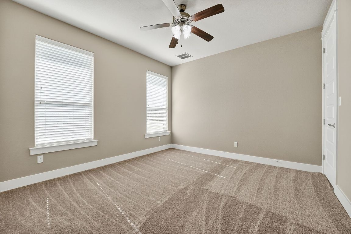 112 Sweetleaf Cove Georgetown, TX 78633 - Photo 11 of 28 a view of an empty room with a window