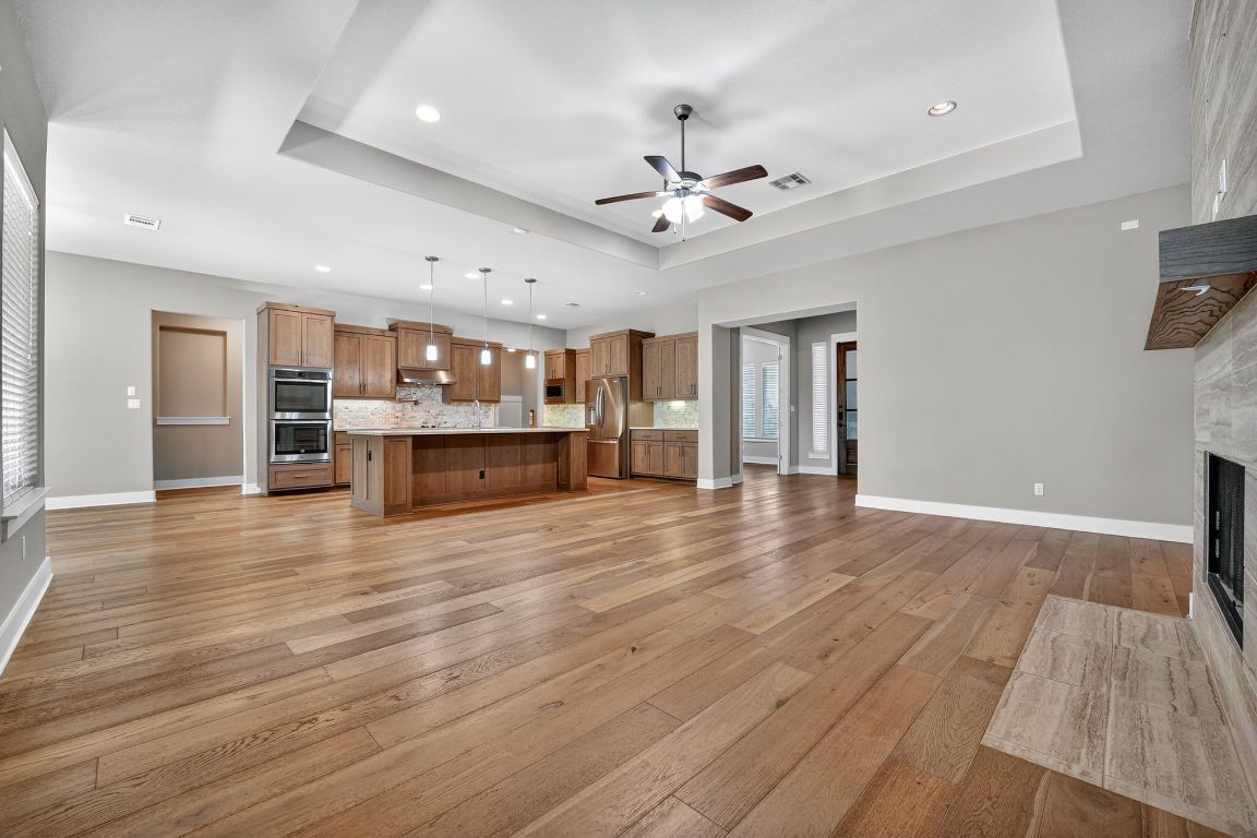 112 Sweetleaf Cove Georgetown, TX 78633 - Photo 7 of 28 a view of kitchen and natural light