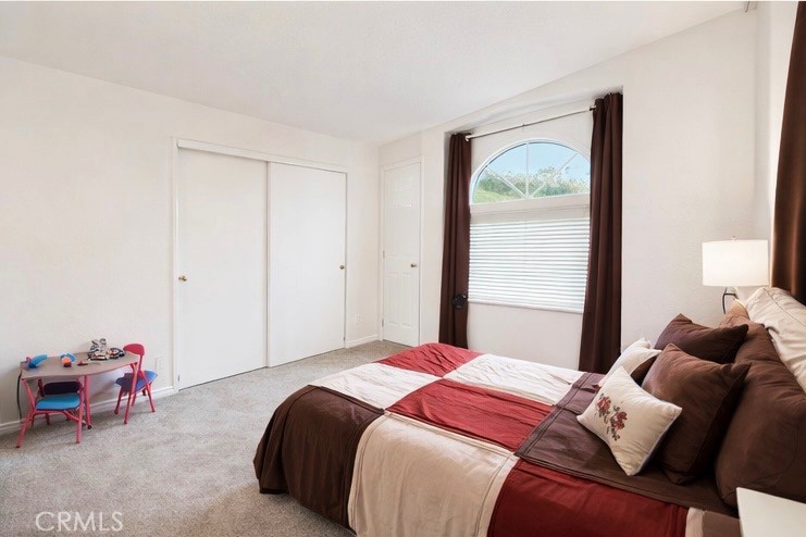 7765 Verna Way Lucerne, CA 95458 - Photo 18 of 37 a bedroom with a bed and a window