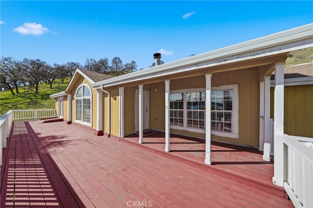 7765 Verna Way Lucerne, CA 95458 - Photo 5 of 37 a front view of a house with a porch