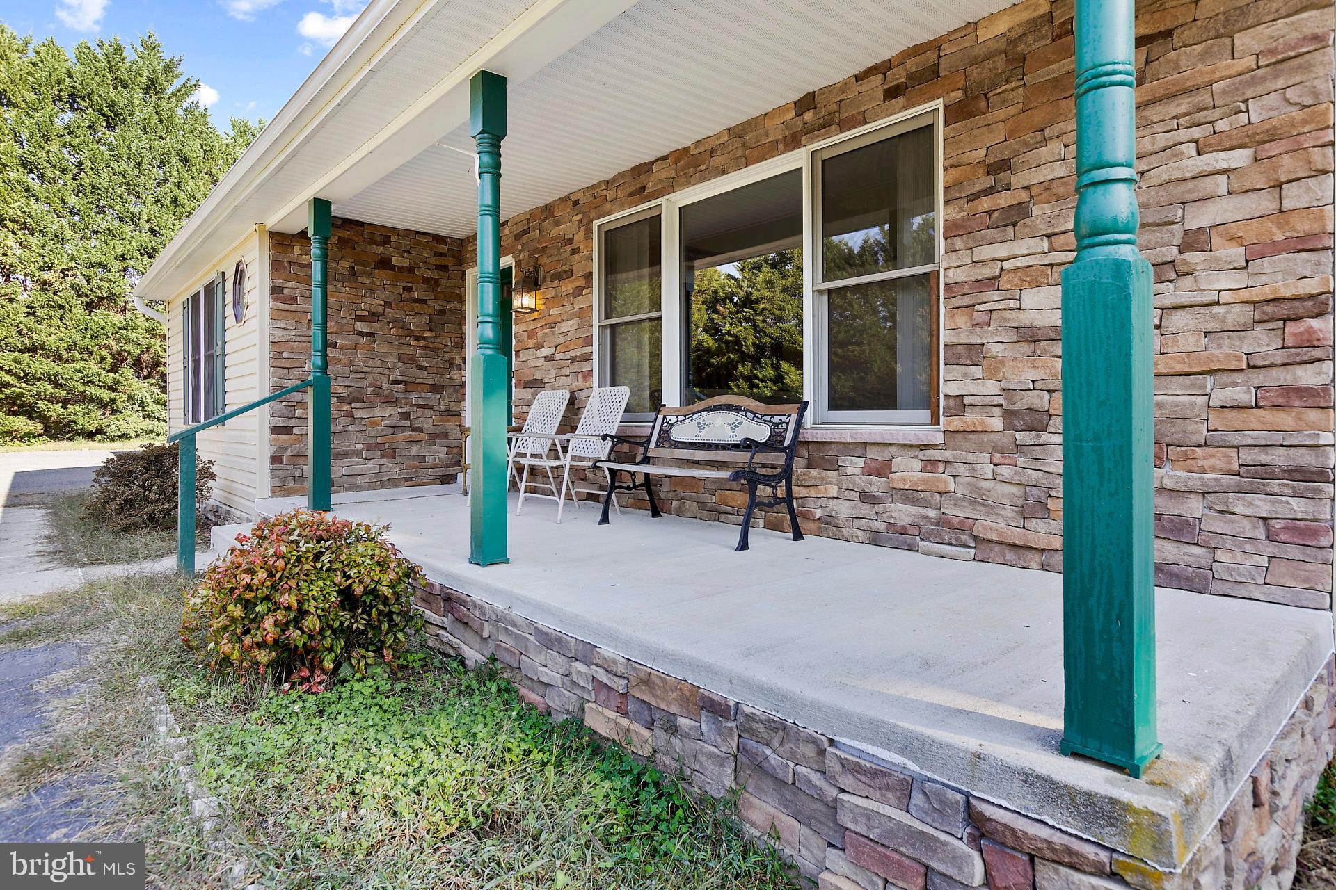 7520 Simms Landing Road Port Tobacco, MD 20677 - Photo 3 of 35 Hang out on your covered front porch.