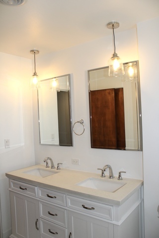 724 Barnsdale Road, Unit 2 La Grange Park, IL 60526 - Photo 12 of 20 a bathroom with double sink and a mirror