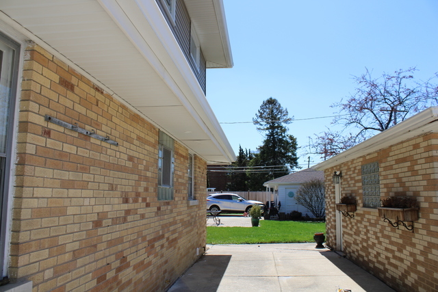 724 Barnsdale Road, Unit 2 La Grange Park, IL 60526 - Photo 19 of 20 a view of a porch with furniture and a yard