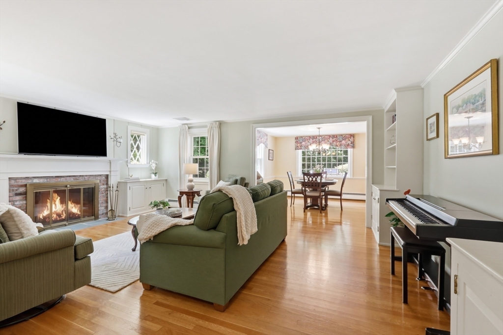 2 Olde Lyme Road Winchester, MA 01890 - Photo 4 of 42 a living room with fireplace furniture and a flat screen tv