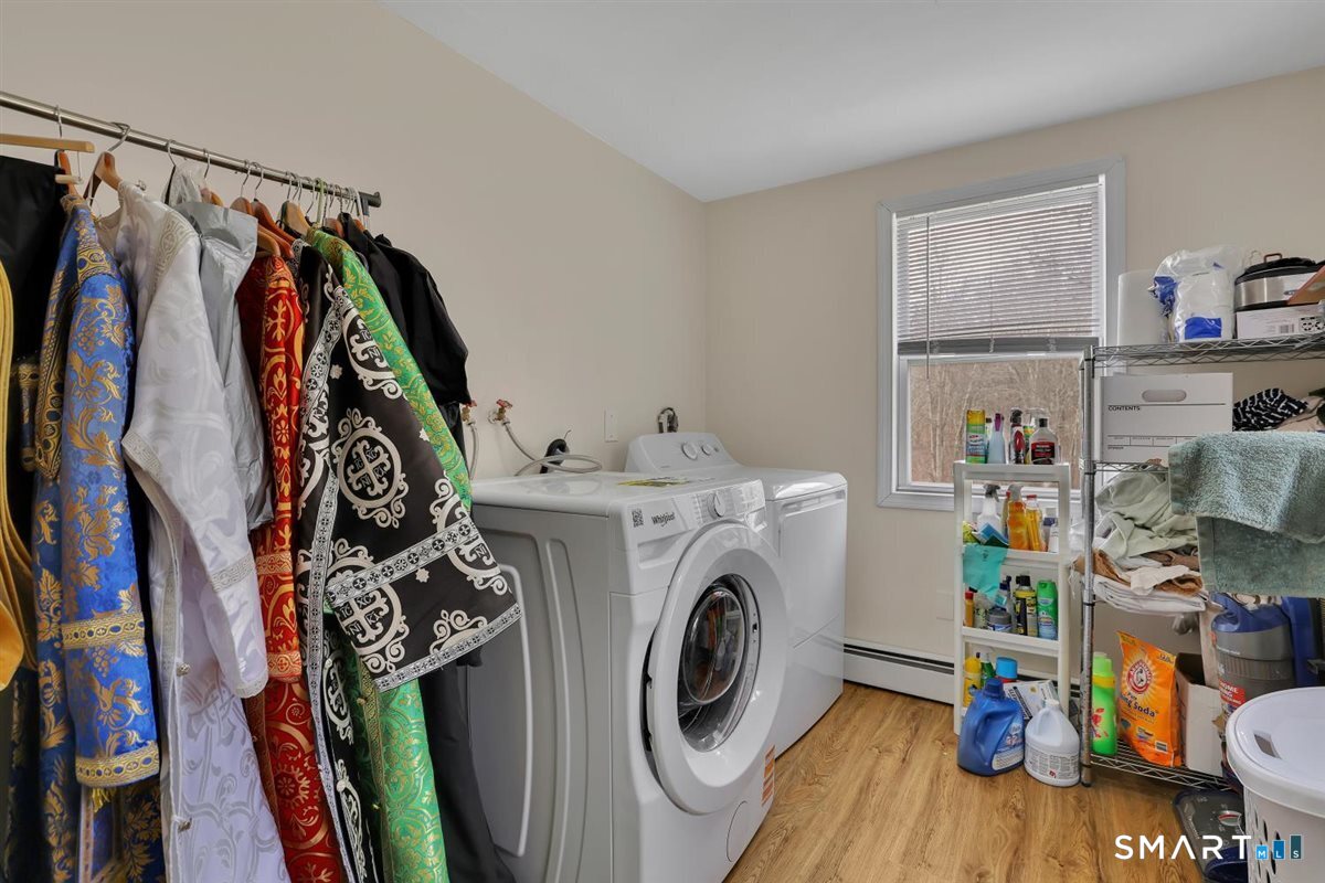 112 Weekeepeemee Road Bethlehem, CT 06751 - Photo 19 of 40 This laundry room could be converted back to a bedroom or home office. There are washer and dryer hookups in the basement as well as the main floor.