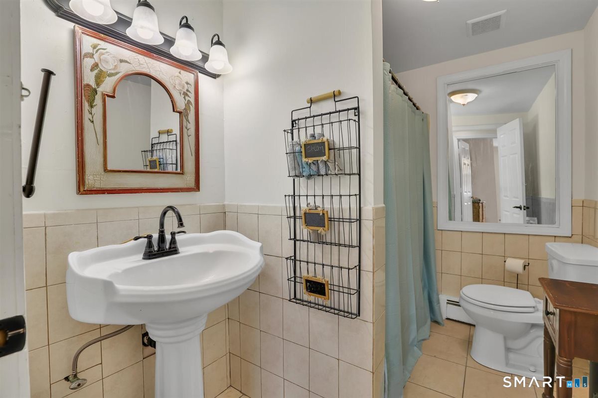 112 Weekeepeemee Road Bethlehem, CT 06751 - Photo 10 of 40 This full bath is located on the first floor, you have the option for one level living.