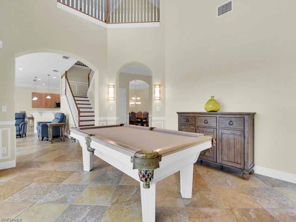 9983 Colonial Walk North Estero, FL 33928 - Photo 13 of 39 a room with pool table and windows