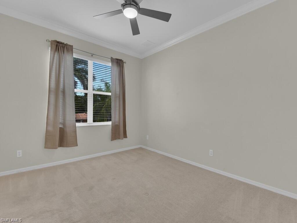 9983 Colonial Walk North Estero, FL 33928 - Photo 26 of 39 an empty room with window