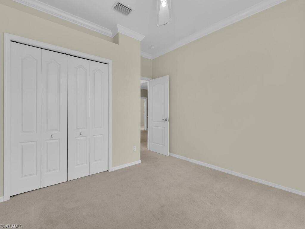 9983 Colonial Walk North Estero, FL 33928 - Photo 28 of 39 a view of an empty room