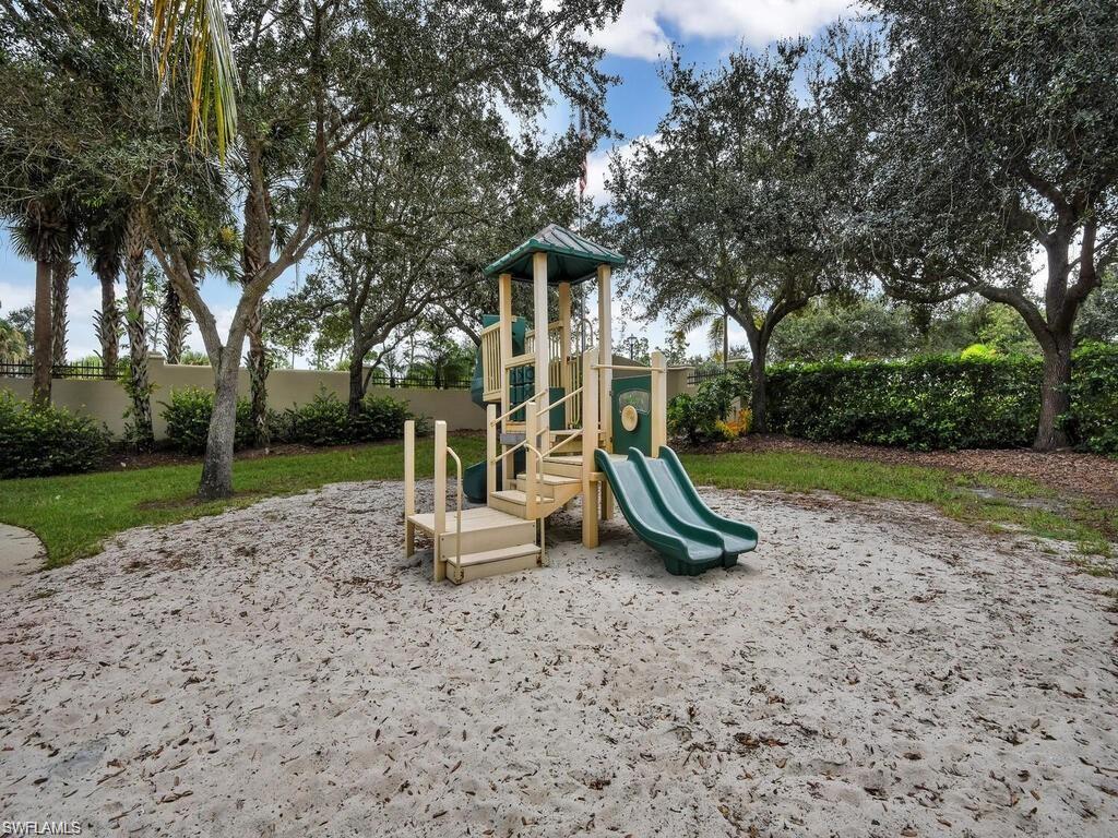 9983 Colonial Walk North Estero, FL 33928 - Photo 38 of 39 a view of a park with a slide