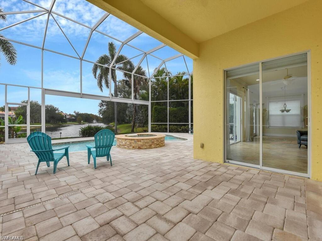9983 Colonial Walk North Estero, FL 33928 - Photo 6 of 39 a view of a house with backyard and sitting area