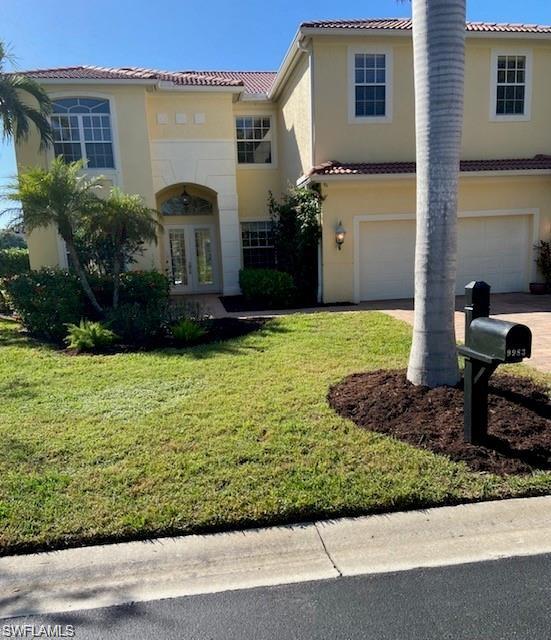 9983 Colonial Walk North Estero, FL 33928 - Photo 7 of 39 a view of a house with backyard and garden