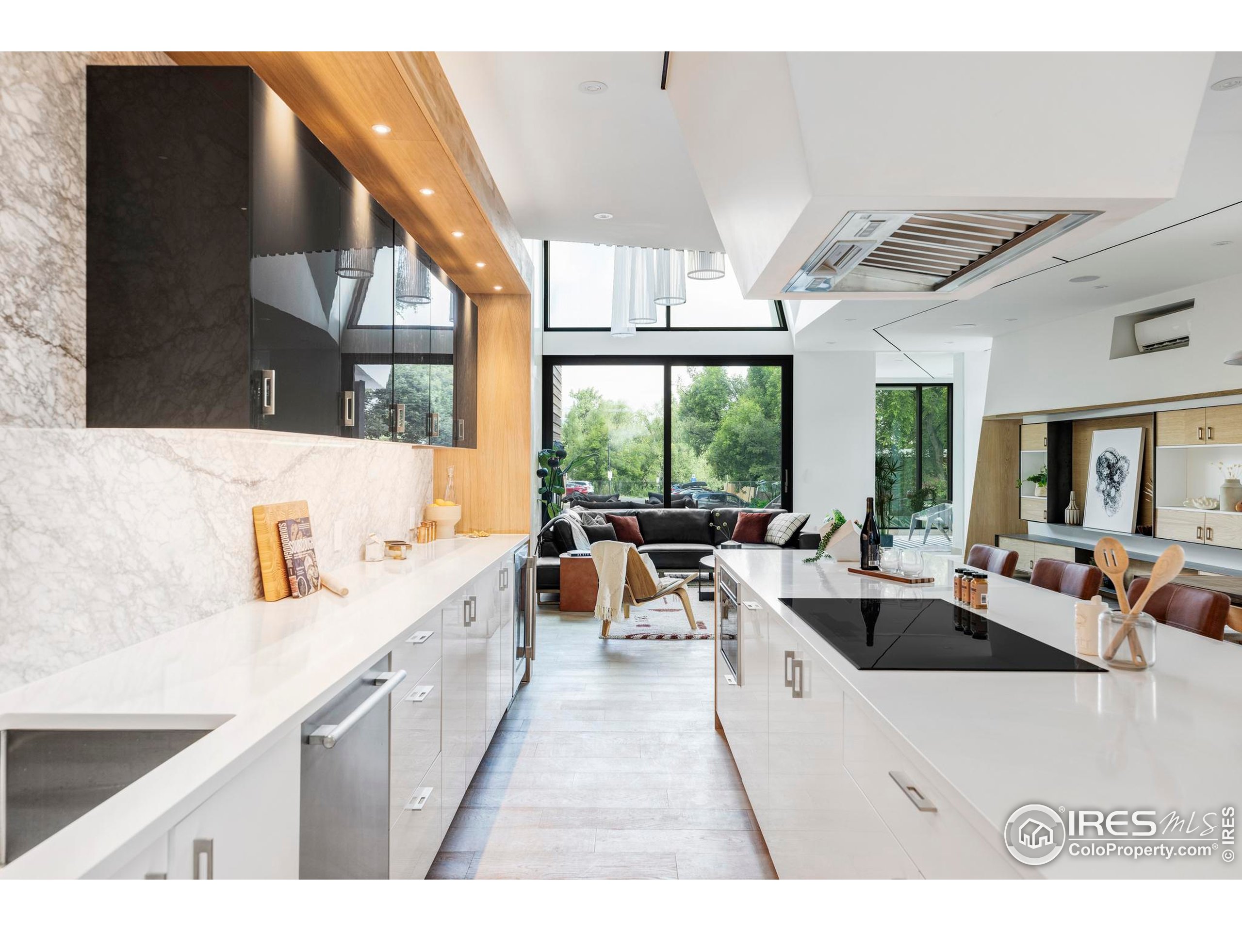 944 Arapahoe Avenue, Unit A Boulder, CO 80302 - Photo 12 of 36 a large white kitchen with a large window