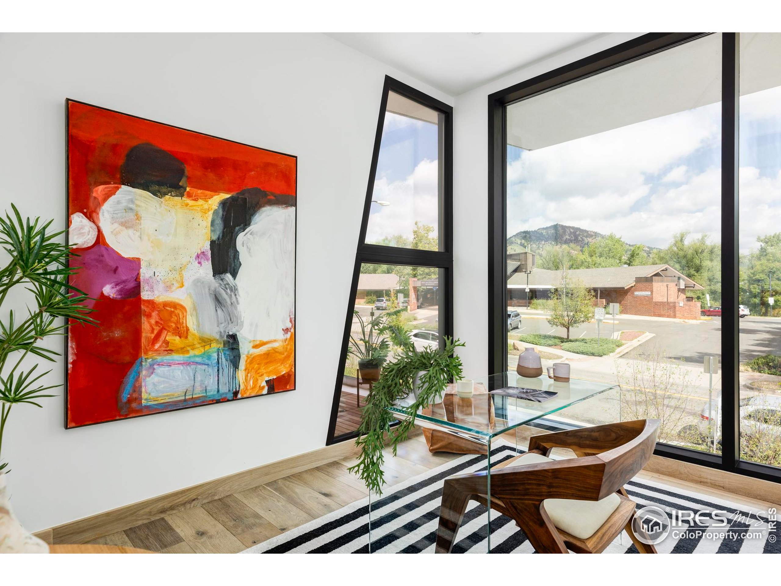944 Arapahoe Avenue, Unit A Boulder, CO 80302 - Photo 16 of 36 a view of a living room with a large window