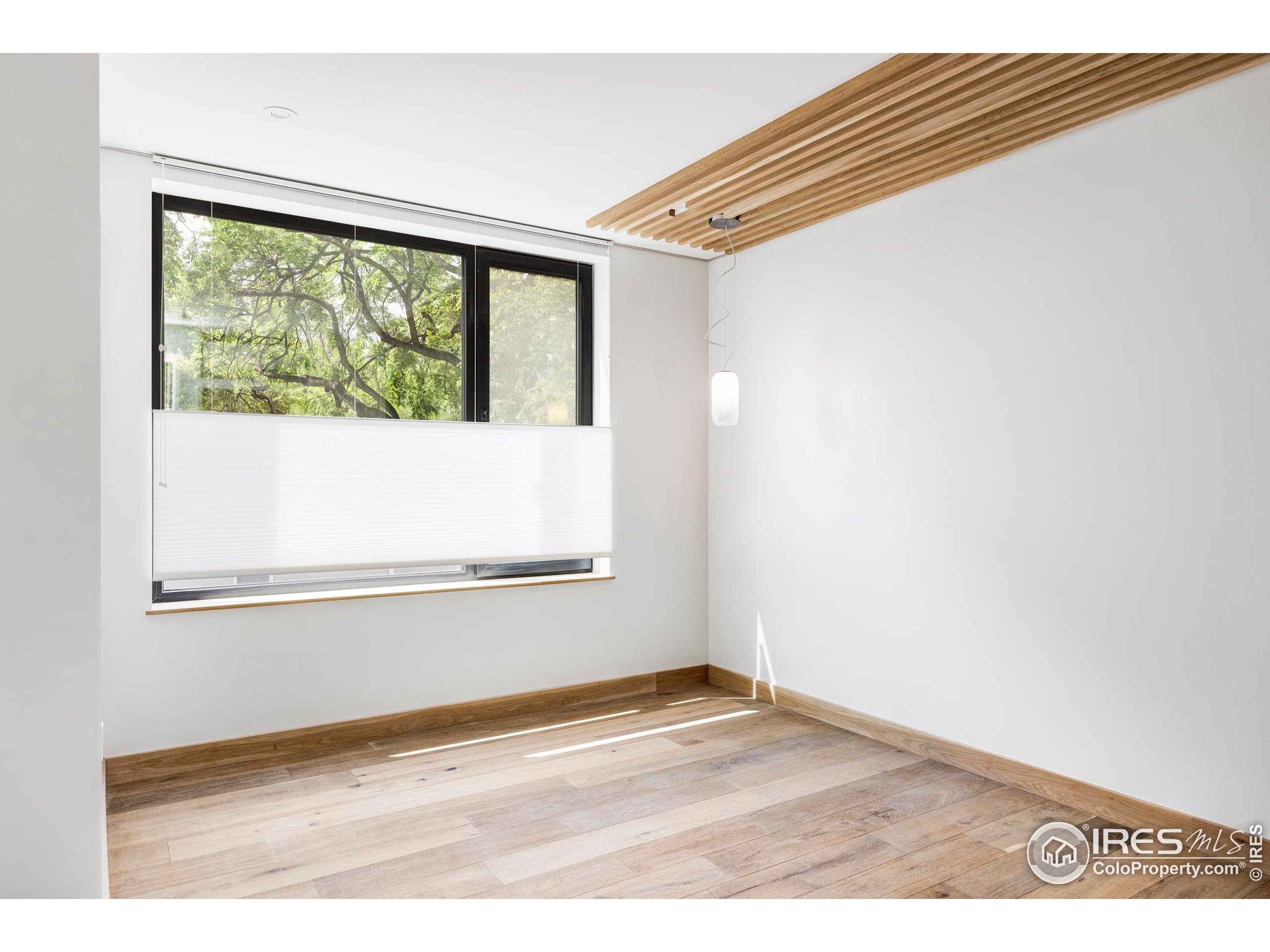 944 Arapahoe Avenue, Unit A Boulder, CO 80302 - Photo 24 of 36 a view of empty room with window