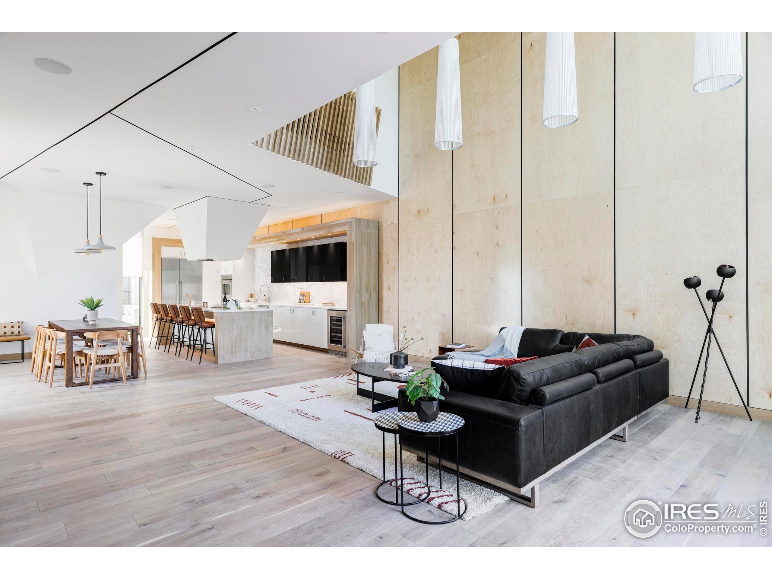 944 Arapahoe Avenue, Unit A Boulder, CO 80302 - Photo 7 of 36 a living room with furniture and wooden floor
