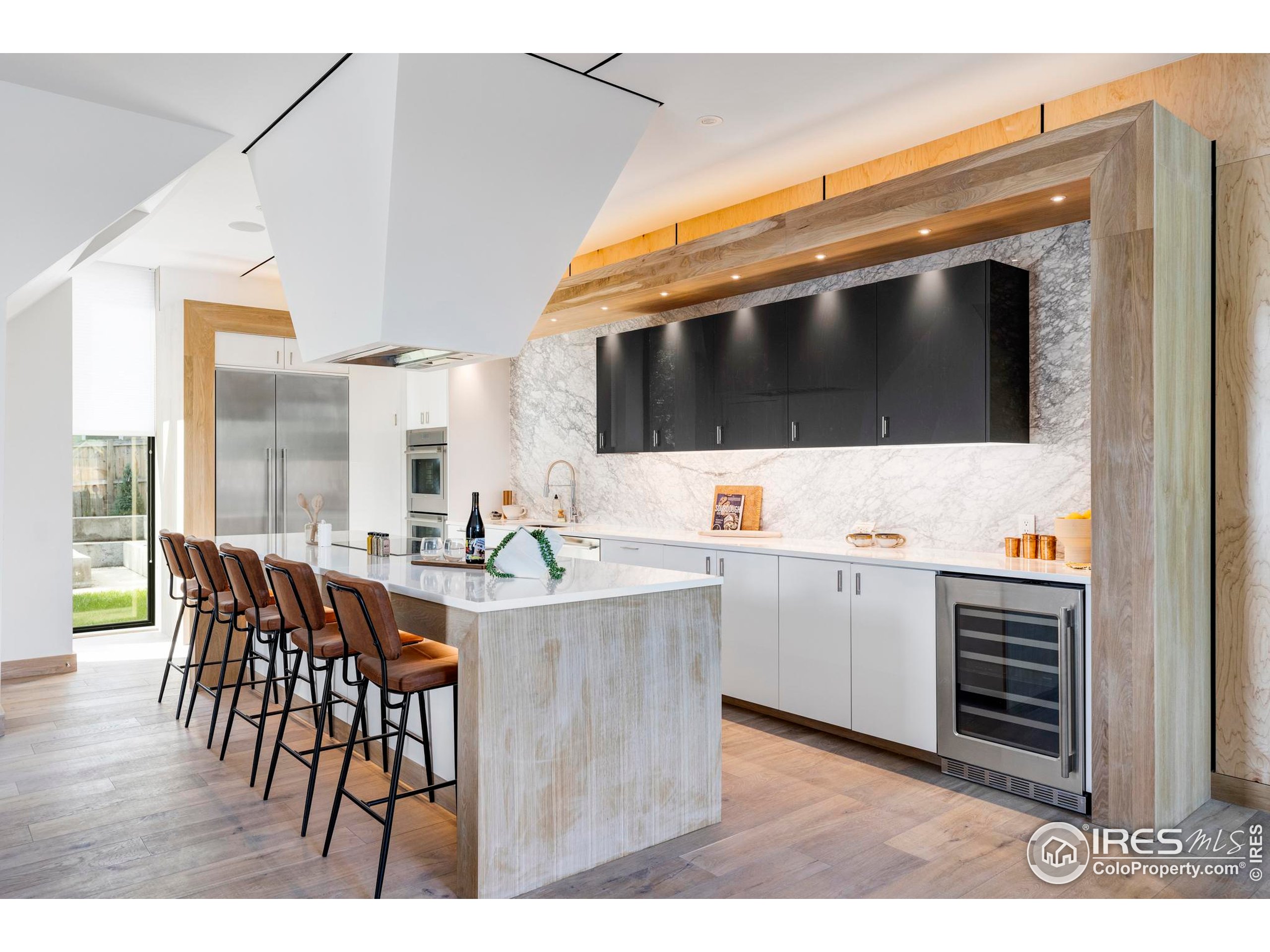 944 Arapahoe Avenue, Unit A Boulder, CO 80302 - Photo 10 of 36 a kitchen with a stove and a microwave