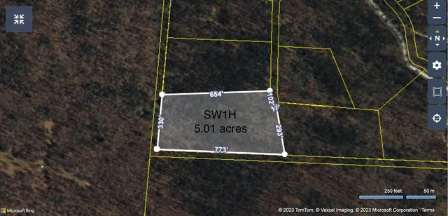 a sign broad on the side of a road