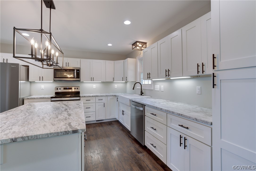 0 Lincoln Road Hanover, VA 23069 - Photo 11 of 36 a kitchen with stainless steel appliances granite countertop a sink refrigerator and cabinets