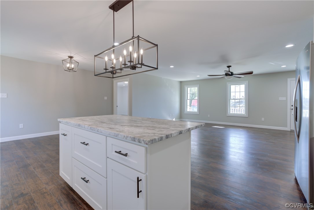 0 Lincoln Road Hanover, VA 23069 - Photo 13 of 36 a kitchen with stainless steel appliances granite countertop a kitchen island a stove and a wooden floors