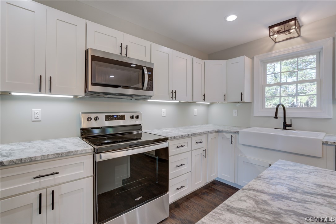 0 Lincoln Road Hanover, VA 23069 - Photo 15 of 36 a kitchen with stainless steel appliances granite countertop a stove a sink and a microwave