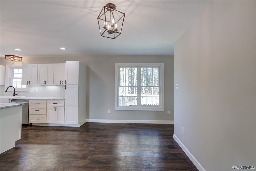 0 Lincoln Road Hanover, VA 23069 - Photo 16 of 36 a view of a kitchen with a sink dishwasher and wooden floor