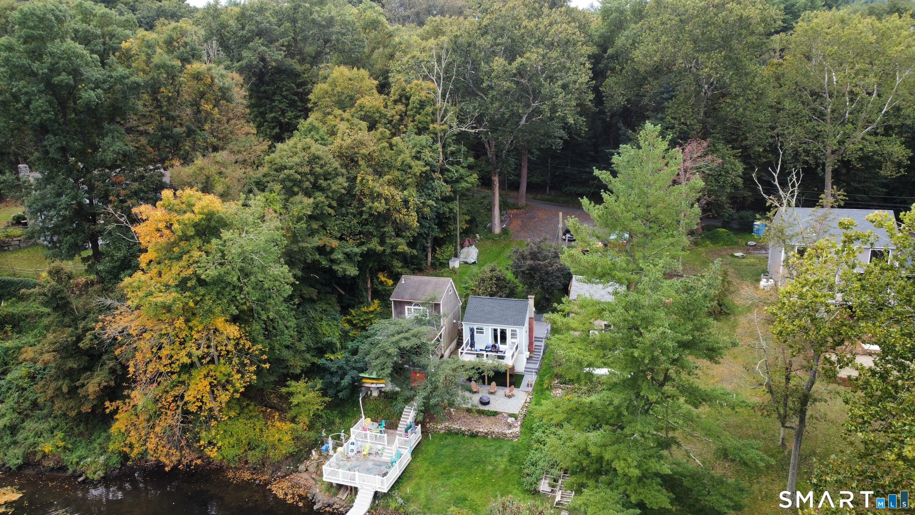 7 Pootatuck Park Road Newtown, CT 06482 - Photo 25 of 25 a view of a house with a yard