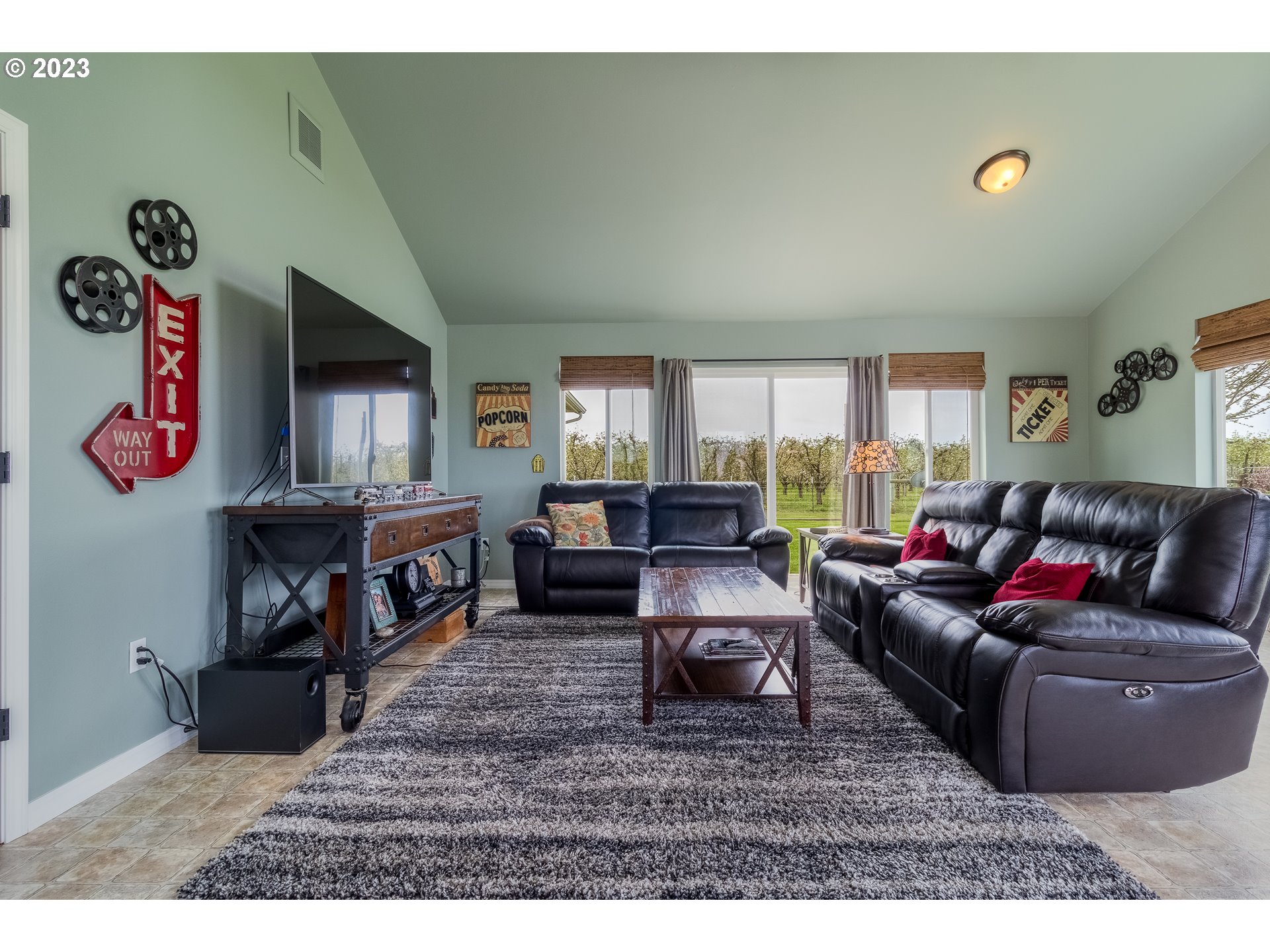 52794 Appleton Road Milton Freewater, OR 97862 - Photo 12 of 35 a living room with furniture and a flat screen tv