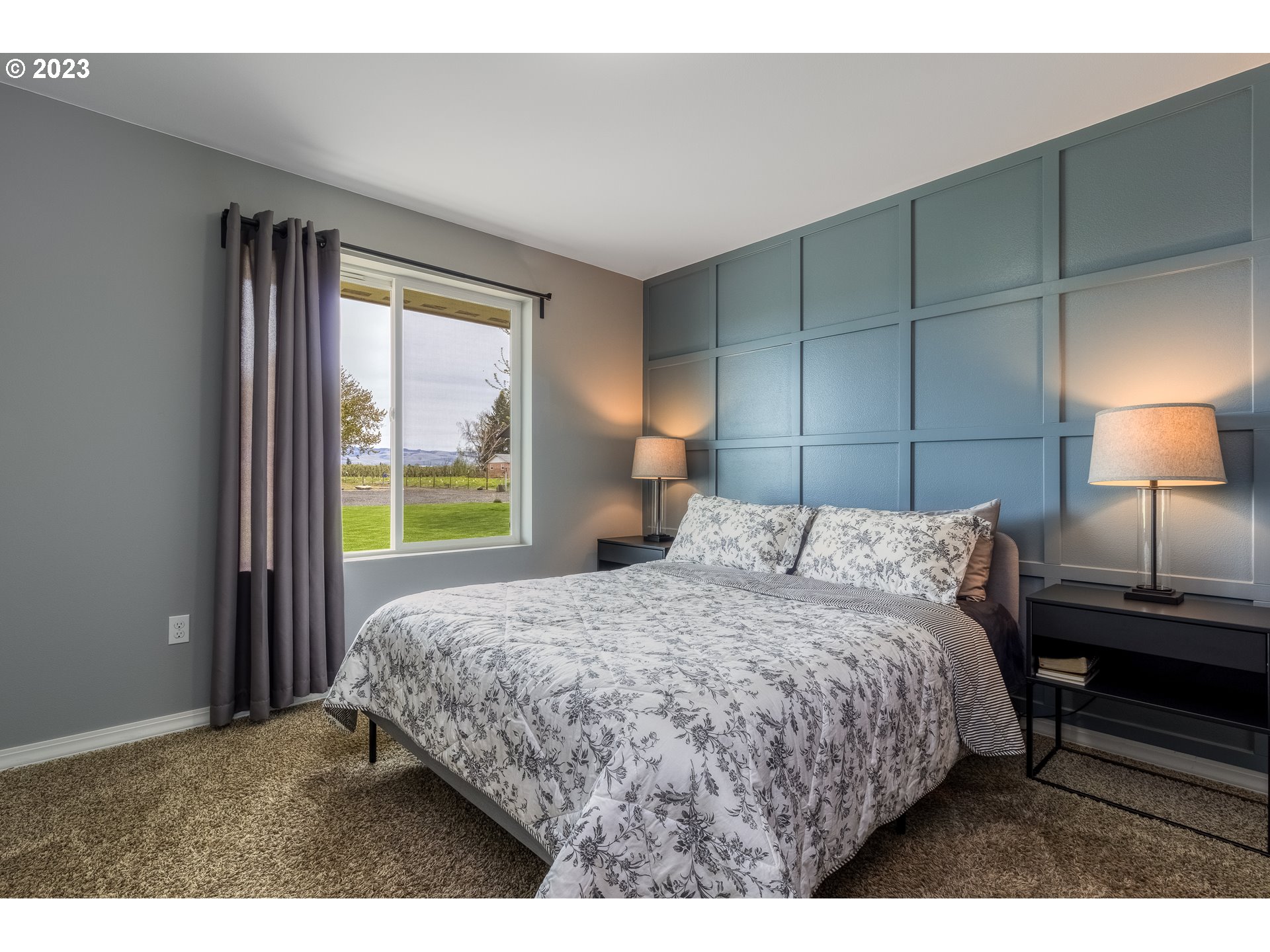 52794 Appleton Road Milton Freewater, OR 97862 - Photo 16 of 35 a bedroom with a bed and a lamp