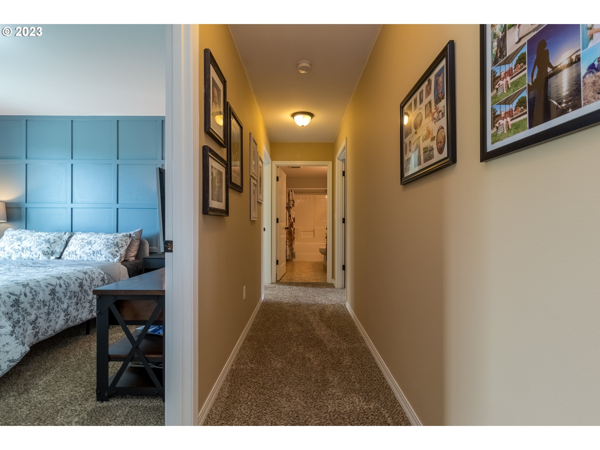 52794 Appleton Road Milton Freewater, OR 97862 - Photo 17 of 35 a hallway with a dining table and chairs
