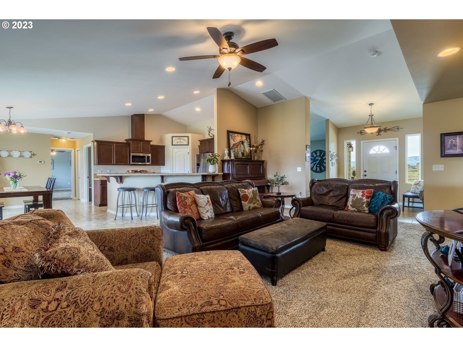 52794 Appleton Road Milton Freewater, OR 97862 - Photo 5 of 35 a living room with furniture kitchen and a chandelier