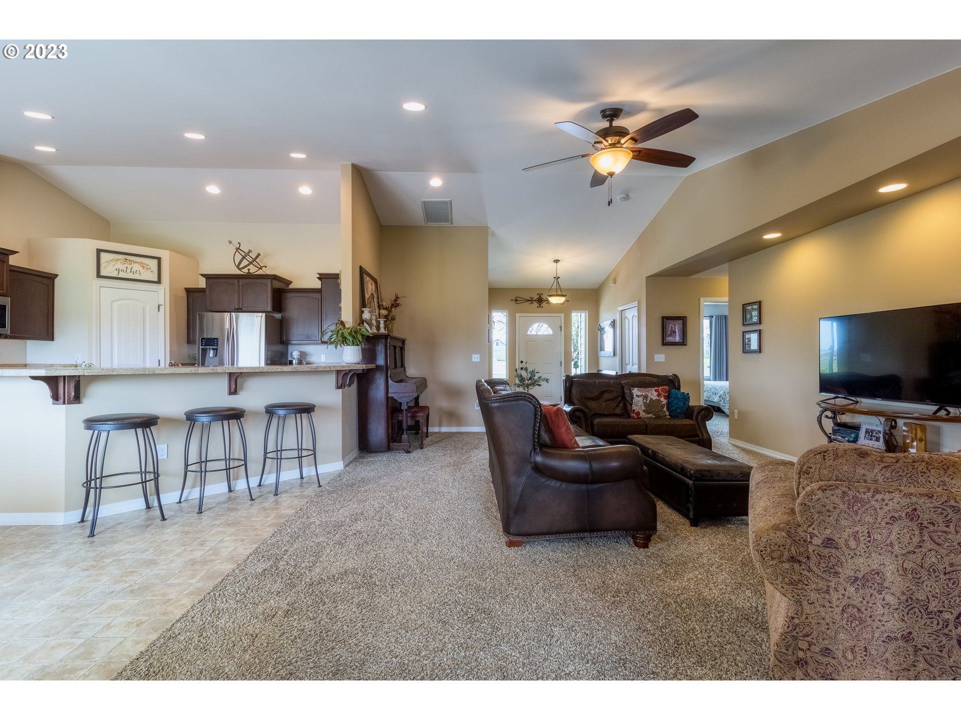 52794 Appleton Road Milton Freewater, OR 97862 - Photo 6 of 35 a living room with furniture and a flat screen tv