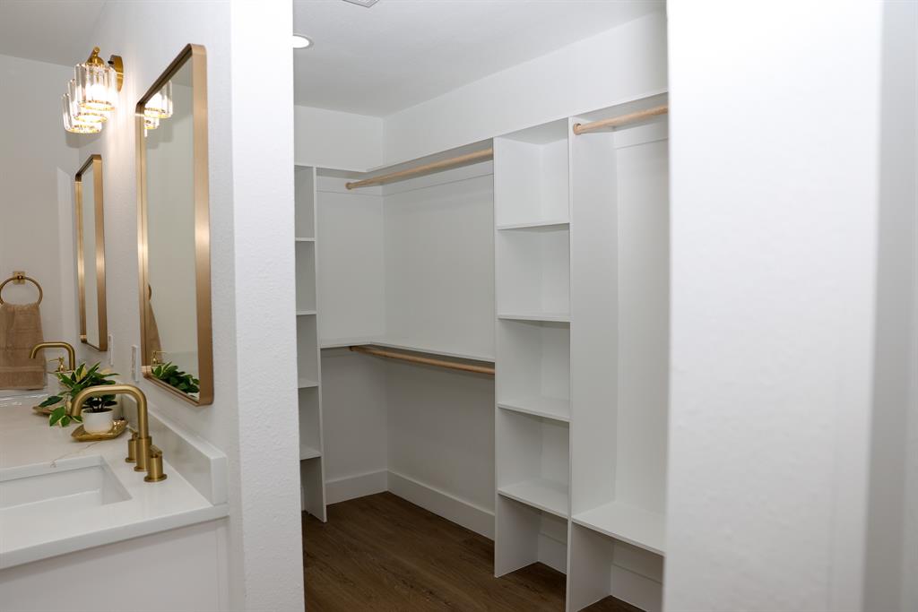 6508 Ember Court Plano, TX 75023 - Photo 17 of 38 Walk-in closet accessible from primary bathroom