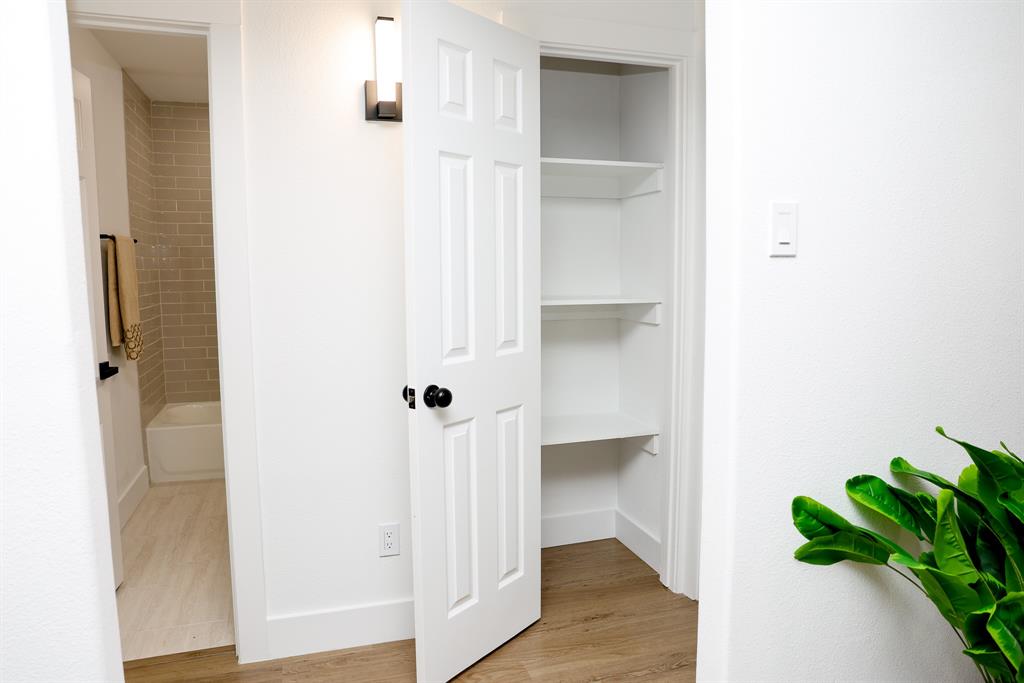 6508 Ember Court Plano, TX 75023 - Photo 27 of 38 Hallway linen closet between bedrooms