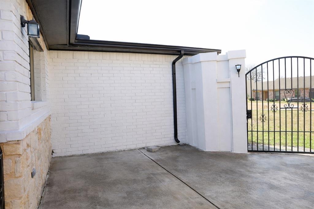 6508 Ember Court Plano, TX 75023 - Photo 37 of 38 Private Gated Courtyard