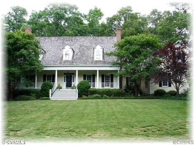 a aerial view of a house with garden