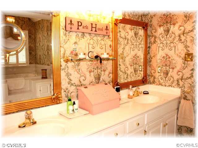 14420 Newgate Road Midlothian, VA 23113 - Photo 9 of 12 a bathroom with a bathtub and shower