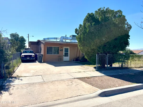 a front view of a house with yard