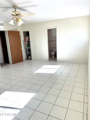 a view of an empty room with window