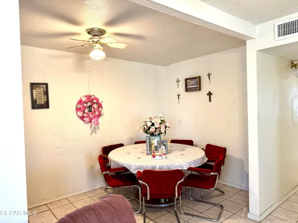 a view of a dining room with furniture